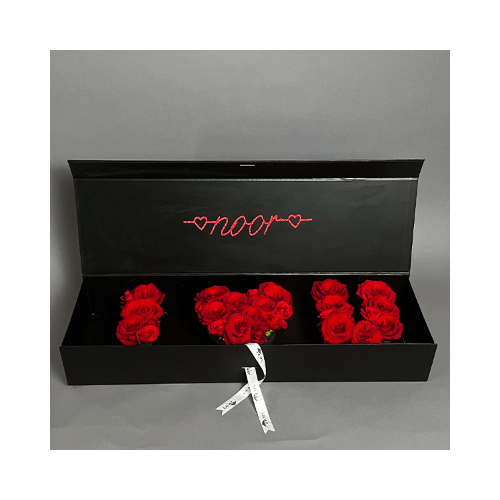 The Love Box - Rectangular black box filled with roses that say 'I Love U' with personalised sticker on top.
 Height: 12cm  Width: 69cm  Sell by: Quantity