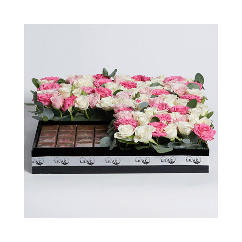 Pink Flower Chocolate - Playful assortment of pink and white with belgian chocolate.
 Height: 12cm  Width: 35cm  Sell by: Quantity