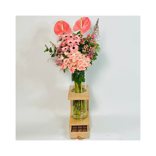 Summer Sun - This wooden stand contains peach Gerbera, peach baby rose, hypercum and astilbi with Belgian chocolate.
 Height: 40cm  Width: 75cm  Sell by: Quantity