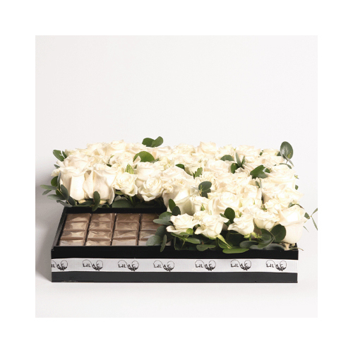 White Rose Chocolate - A white roses and baby roses box with Belgian chocolate.
 Height: 12cm  Width: 35cm  Sell by: Quantity