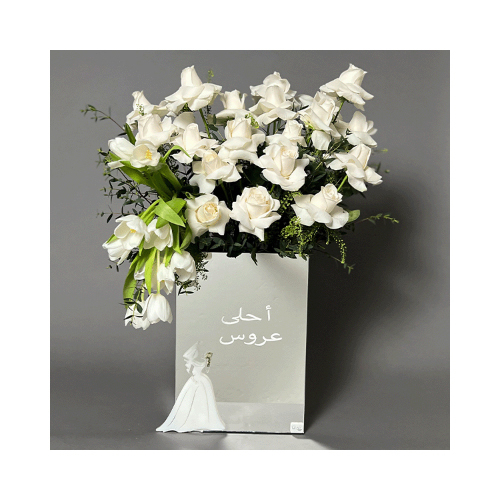 Bride - This mirror vase contains white roses and tulip flowers with green leaves.
 Height: 65cm  Width: 45cm  Sell by: Quantity