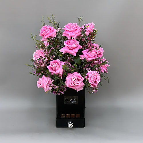 Golden time - Black wooden vase with pink rose, touch of purple wax and Belgian chocolate  Height 54 Width 36