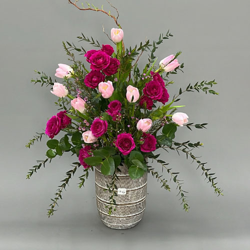 Wintry wonder - Gorgeous vase with pink tulips and fuchsia baby rose  
 Height 80  Width 50