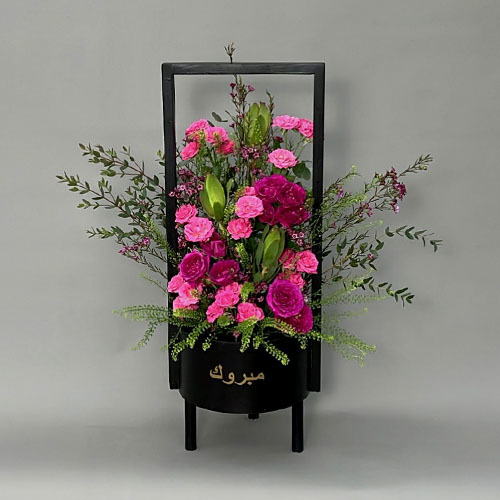 Pink perfection - Wooden black  basket with pink baby roses and fuchsia baby rose  
 Height 65 Width 60