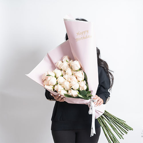 Pink - Hand bouquet with light pink wrapping papers and light pink roses  
 Hight 65  Width 60