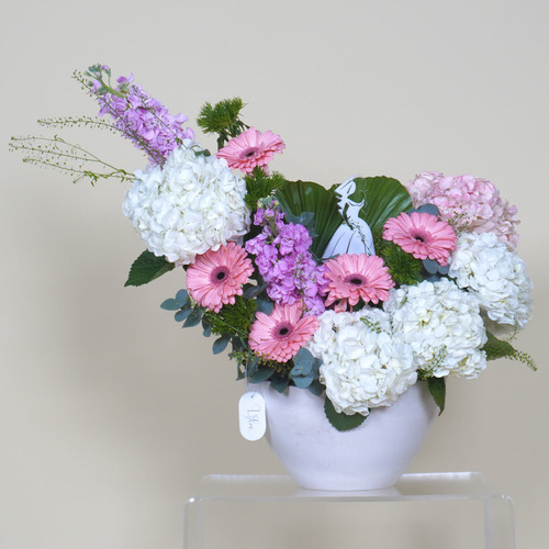 Delia - The most beautiful gift for the bride with bridal design,  contain white hydrangea, pink hydrangea, pink gerbera with bride.  Hight 65  Width 53