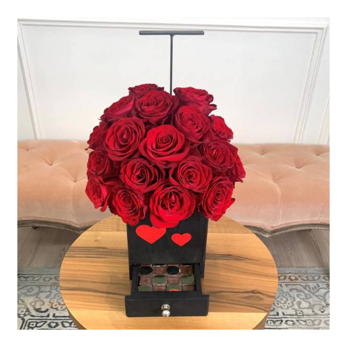 Proposal 1 - A wooden black basket full of red roses with Belgian chocolates and red heart label. 

Height: 47 cm
 Width: 25 cm