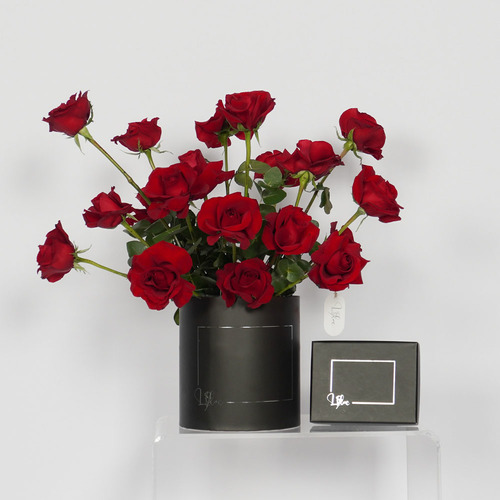 Riley - Black box contain red roses with a box of Belgian chocolate. Height 55 Width 60