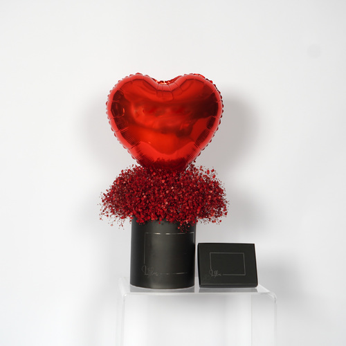 القلب الاحمر - Black box contain red gypsophila, heart shape red balloon and a box of Belgian chocolate . Hight 65 width 46