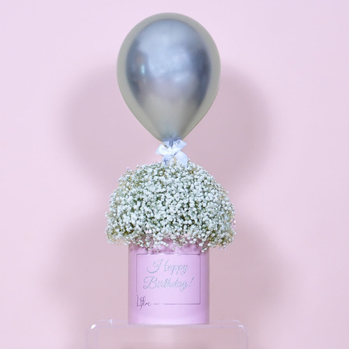 Jane - Pink box contains white gypsophila and balloon. Height 79 Width 32