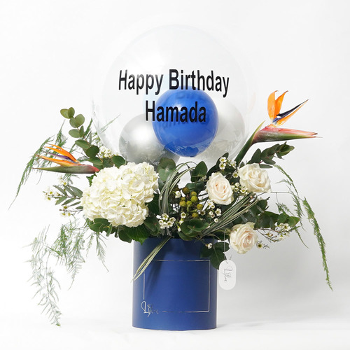 Blue Paradise - Blue box contains birds of paradise, white hydrangea, white rose and personalised balloons. Height 73 Width 70