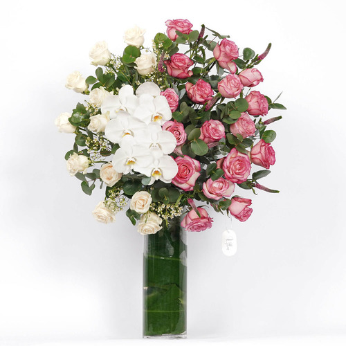 Half white / Half pink - A glass vase contains white rose, white was, white orchid, pink rose and pink Veronica  Height 87 Width 65