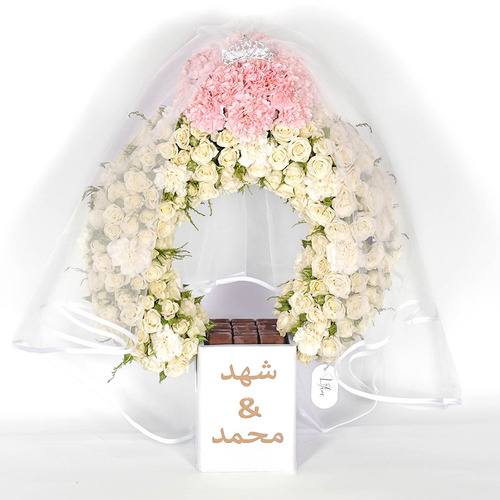 Bride ring - Wooden vase contains white baby rose, pink carnation and Belgian chocolate  Height 65 Width 45