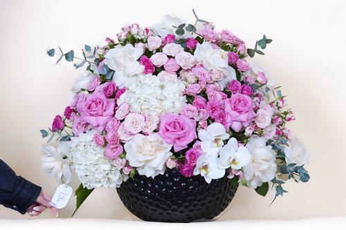 Retal - Black ceramic vase contains pink rose, pink baby rose, white rose, white baby rose, white hydrangea and white orchid  Height 55 Width 64