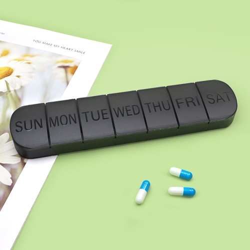 PORTABLE 7-DAY PILL ORGANIZER / U32 - 7-compartment pill organizer