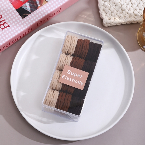 24-PIECE SCRUNCHIES - S83E - The set includes four colors :black, brown, tan and cream.