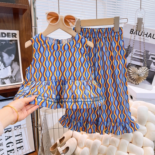 GIRL'S BOHEMIAN VEST TOP AND PANTS SUIT / S204F - blue and orange wavy-pattern peplum top and shorts set.
