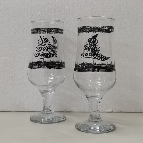 2-PIECE 370ML JUICE GLASSES BO522 - Brand: Bloom stem collection Capacity: 12.5. oz(370ml) Design: arabic calligraphy and city skyline graphics