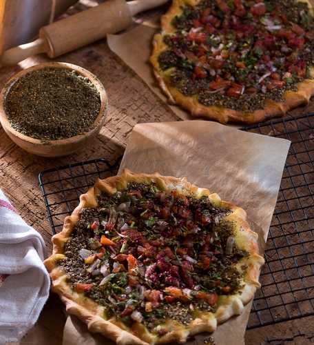 Manoosha Zaatar  Alsham - thyme, tomatoes, onion, parsley & sliced olive
Preparation time 12 minutes