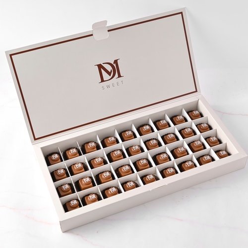 Deluxe Box - It consists of 36 special chocolate pieces with six fillings (Rocher - Ravello - Caramel - Pistachio - Cardamom - Lotus)