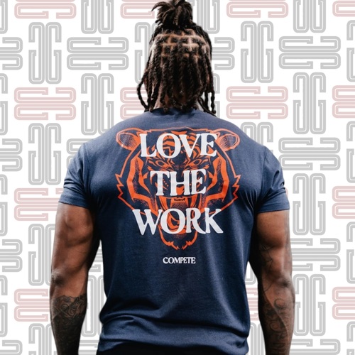 CED The Difference T-Shirt - “The Difference” tee from Compete Every Day is a celebration of the process . . . the day to day workout grind that separates the passionate athlete from the results-seeker. This Deep Blue crewneck shirt includes a small COMPETE graphic on the chest and a large “LOVE THE WORK” slogan on the back, overlaid on a roaring tiger head design. Each tee is made from a quality tri-blend fabric, offering a comfortable range of motion in the gym and optimal comfort as casual wear outside it. Compete Every Day is based in the U.S. and produces a wide range of motivational training apparel. As CEO Jake Thompson puts it, competing every day isn’t just about what you do in the gym, “it’s about taking control of your life. Refusing to let fear keep you from achieving your goals.”Material Type50% Polyester / 25% Cotton / 25% RayonCare InstructionsMachine Wash Cold, Tumble Dry Low to Medium