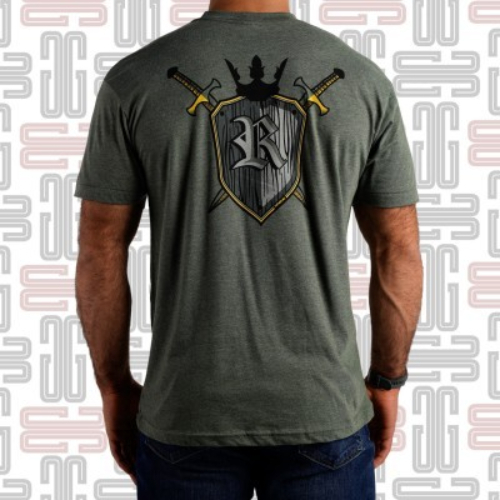 Rogue Ray Williams Shield Tshirt - The “Shield” t-shirt is the latest Signature Series design inspired by Rogue athlete and powerlifting champion Ray Williams. Available in green with gold accents, this men’s / unisex crewneck includes a special five-star Rogue logo on the chest and a large shield crest on the back, with the letter R featured on the emblem. Material Type 50% Cotton / 50% Polyester Care Instructions Wash Cold, Dry Low