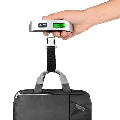 luggage scale - portable electronic luggage scale  - Capacity: 50 kg / 110 lb. - LCD digital screen. - comfortable grip coated with rubber. - Room tempreture display. - convertable units ( KG & LB ) - 3v lithium battery ( Included ). - High quality materials.