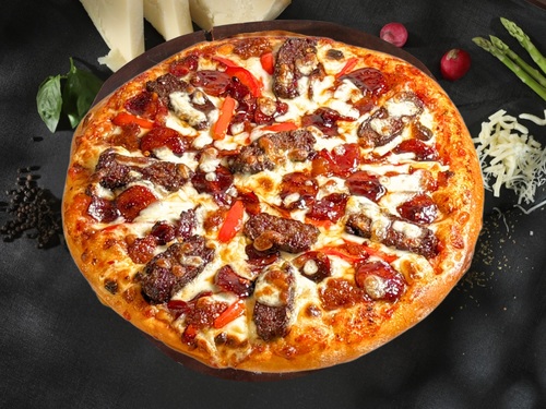 Meat lover Pizza - Hand made thin crust pizza topped with minced meat, Beef bacon ,Beef sausages and our signature sauce .
