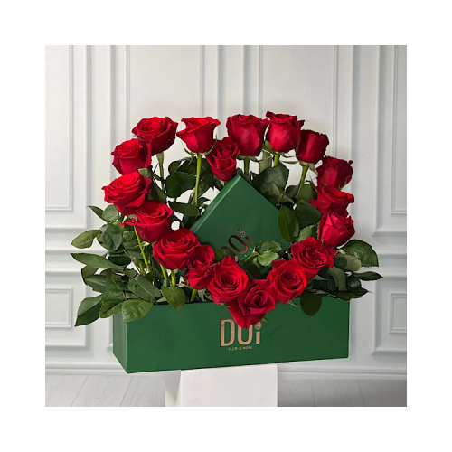 ESMA - This green box contains red roses with a box of chocolates Height: 60cm Width: 35cm