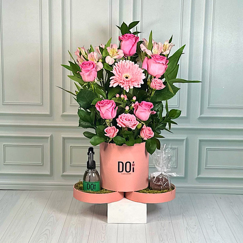 Visico - Pink box contains pink alstroemeria, pink hypericum, pink roses, pink gerbera, pink baby roses with spray 150ml and chocolate. Height: 60cm Width: 30cm