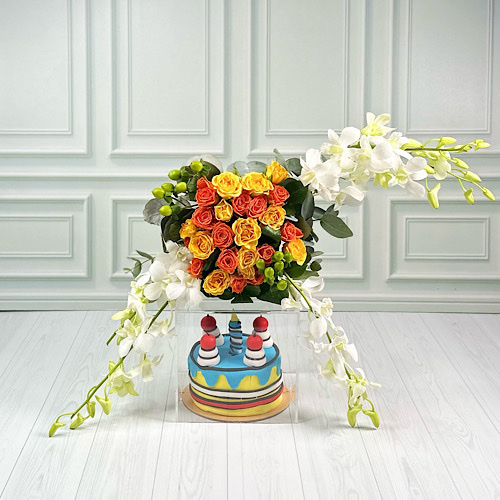 Yellow Birthday - Acrylic box contains Yellow and Orange baby roses, Green hypericum, White baby orchid and Green leaves with candle cake.Height:30cmWidth:15cm