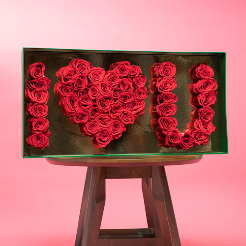 Love Box - Love box contains red roses with box of chocolates. Height: 45cm Width: 100cm