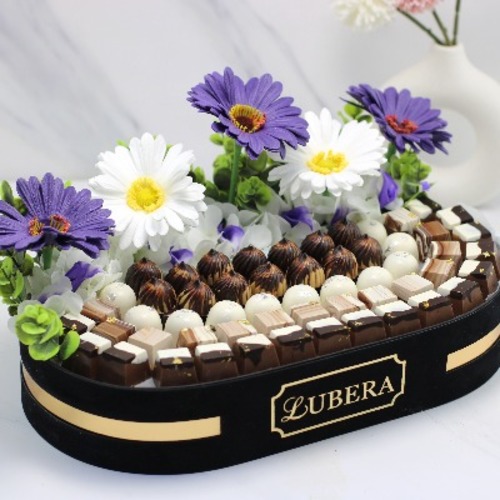 Chocolate oval shape with artificial flowers 700 grams - 700 gr