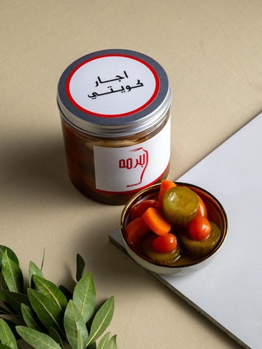 Achar kuwaity - Cucumber, mountain garlic, carrots, tomatoes, vinegar, and Kuwaiti spices