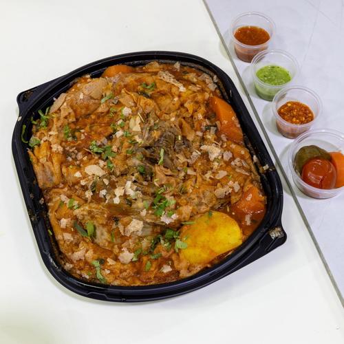 lamb tashrib - Raqq bread with tomato sauce kuwaiti seasoning lamb fresh vegetables