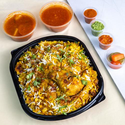 Masli Chicken - half of chicken fresh with basmati rice roes water peesents with bhoth potatoes doqoos and Mabouch red green