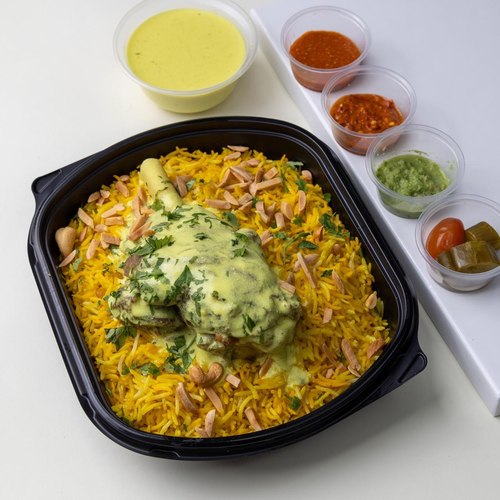 Mansaf Lamb Arabic - Lamb Arabic fresh cooked with yoghurt seasoning with rice saj bread parsley nuts yogurt sauce Agar green and red mabouch