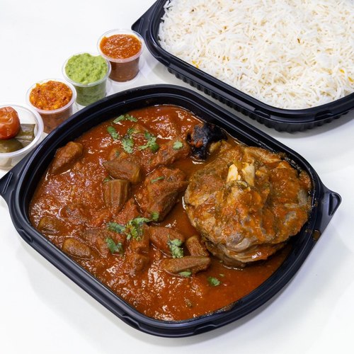 Maraq okra lamb - okra cooked with fresh Arabic lamb with tomato sauce progress white rice