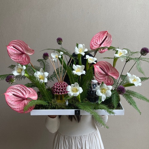 Alooha to you I - An arrangement of flowers with your choice of Riccio Caprese diffuser and chocolates in a big white tray *Flower kind and color may slightly differ based on availability.