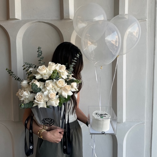 Pure white with cake - A metallic box filled with roses, box of small cake and 3 baloons  *write the desired name on the cake in the message box L30 H 60