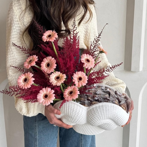 Gratitude - A decorative white ceramic vase decorated with flowers and dates filled with sesame, hazelnut and walnuts *Flowers color and kind may slightly differ based on availability  Notice: Order will be delivered within 24hrs