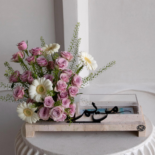 Purple melow - An arrangement of flowers in a travertine tray
*write the desired name or phrase on the tray in the message box *Flower color and kind may differ slightly based on availability
L40 H25