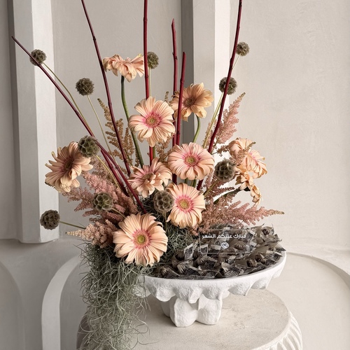 Neqsat Altaqwa - A decorative ceramic stand decorated with flowers and dates filled with rahash and sesame *Flowers colors and kind may slightly differ based on availability