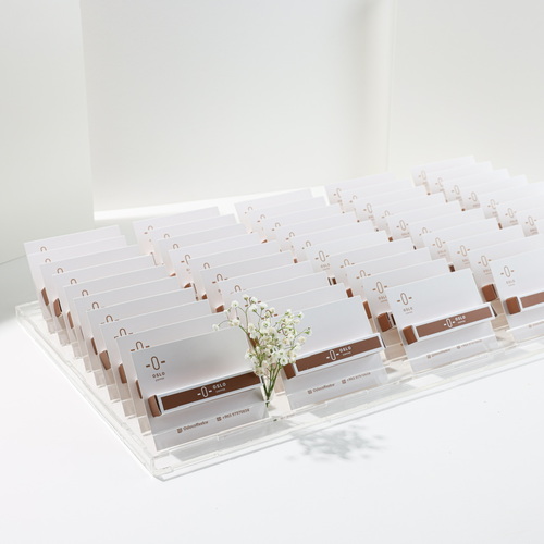 Longo package 2 - A beautifully innovative acrylic tray that contains: 
50 box of Longo chocolate. Inside each box are two pieces of chocolate.