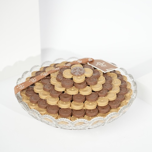 Crystal mini flowers - A luxurious crystal tray filled with one full kilogram of our exquisite Mini Fleur chocolates, beautifully arranged to suit refined occasions.
An ideal choice for gifting or as a statement piece on an elegant reception table.