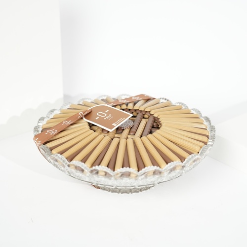 Crystal longo chocolate - A luxurious crystal tray with a refined geometric arrangement of premium ,chocolate sticks 800 grams A flawless mix of milk and caramel chocolates, elegantly displayed in a clear crystal bowl — perfect for gifting or enhancing your elegant reception table.