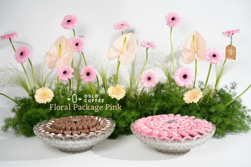 Floral Package Pink - A luxurious and versatile arrangement featuring a 75 cm tall natural floral display, divided into three movable sections, paired with two elegant trays of Oslo’s premium chocolates and mini flower biscuits — a perfect blend of beauty and refined hospitality for any special occasion. For custom item selections, please contact the store directly.