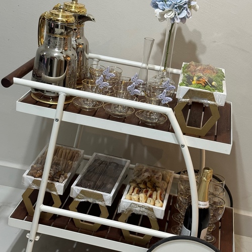 Trolly ( 8-10 ) Persons - Includes tea and coffee mugs A dessert type + a pastry type +grape leaves and a heater type+ betfor type  6 cups and 6 cups + juice including trolley decorations