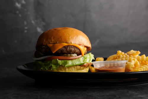 Classic Burger - 1Beef Patty, 3Pieces pickles, tomato, lettuce, White Onion Ring, Mustard, ketchup, Cheese,  Fat 38.8g Saturated fat 13.5g Trans fat 2.3g Cholesterol 108mg Sodium 998mg Carbohydrates 46.2g Net carbs 43.6g Sugar 5.8g Fiber 2.6g Protein 35.5g Calcium 139mg 14%