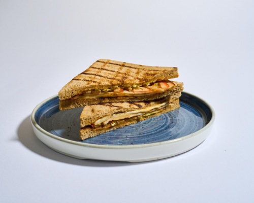 Turkey Cheese Toast - Brown toast, white light cheese, turkey slices, tomato pieces, lettuce, cucumber, pickle and honey mustard sauce. Calories 336 , Protein 20.9g , Carb 42.3g , Fat 9.3g .
